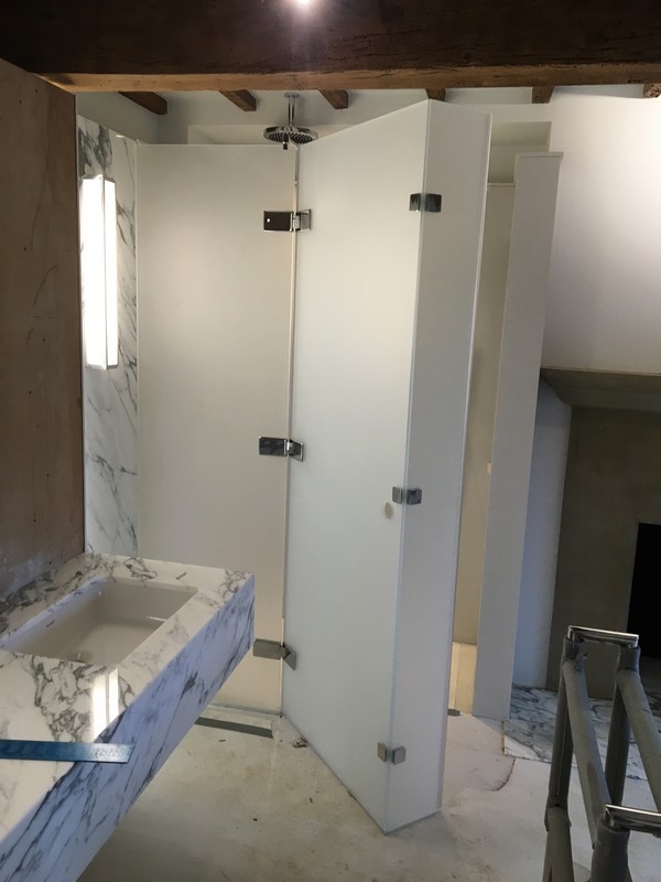 Bespoke frosted glass shower enclosure in Holland Park luxury bathroom