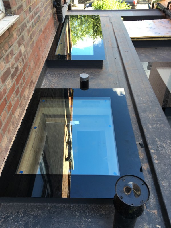 Multiple flat roof skylights on extension in Holland Park