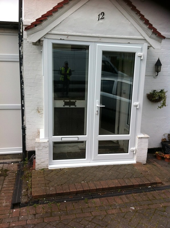 uPVC French doors fitted as front entrance in Holland Park